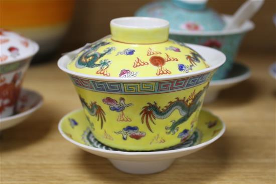 Five Chinese porcelain rice bowls, covers and stands, together with two spoons, second half 20th century, bowls 10.5cm diameter